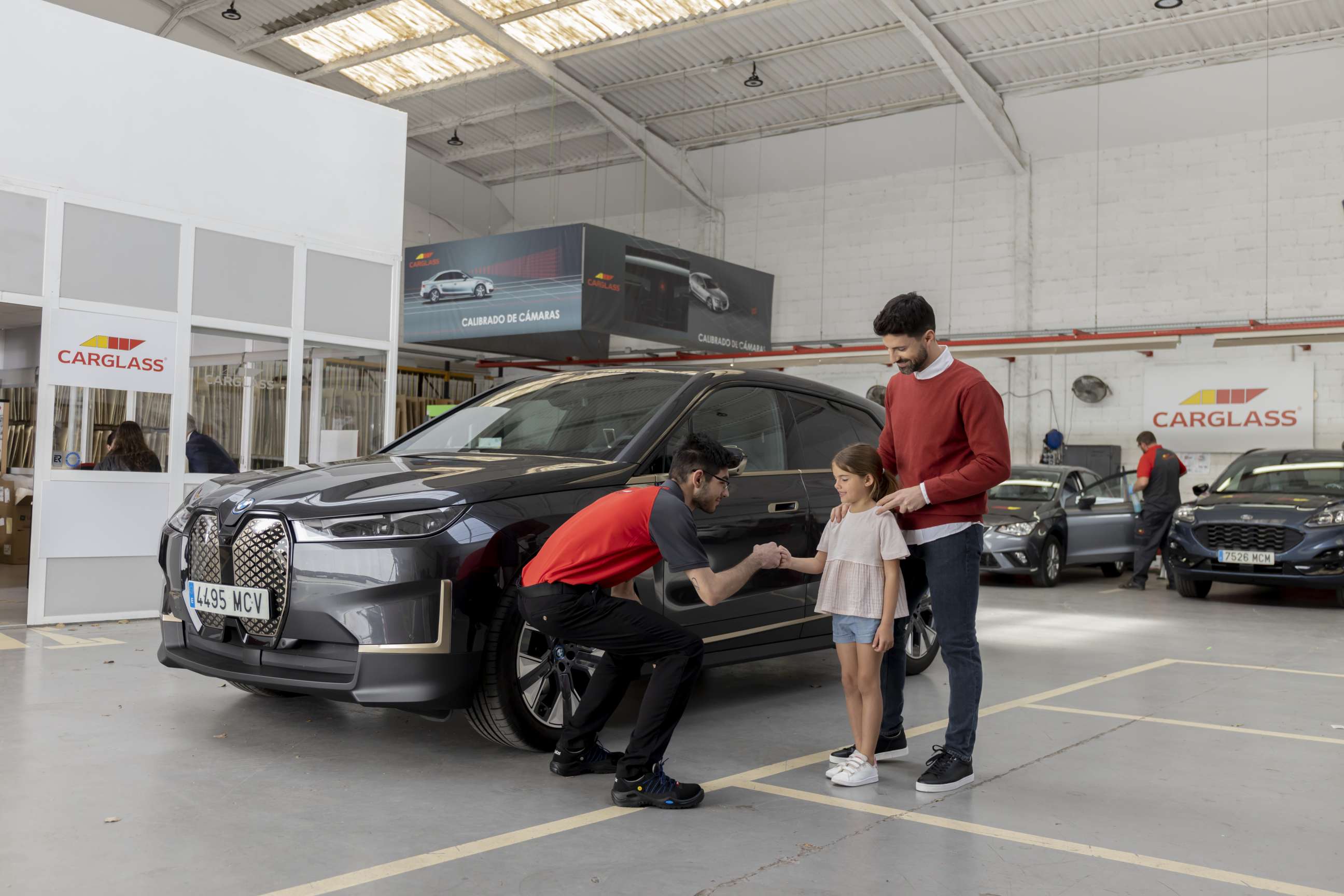 Technician talking to customers