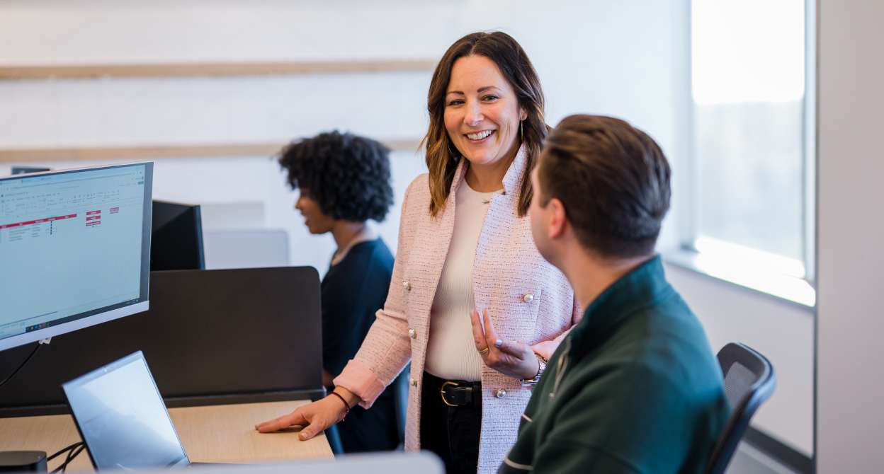 Smiling desk-based colleagues 